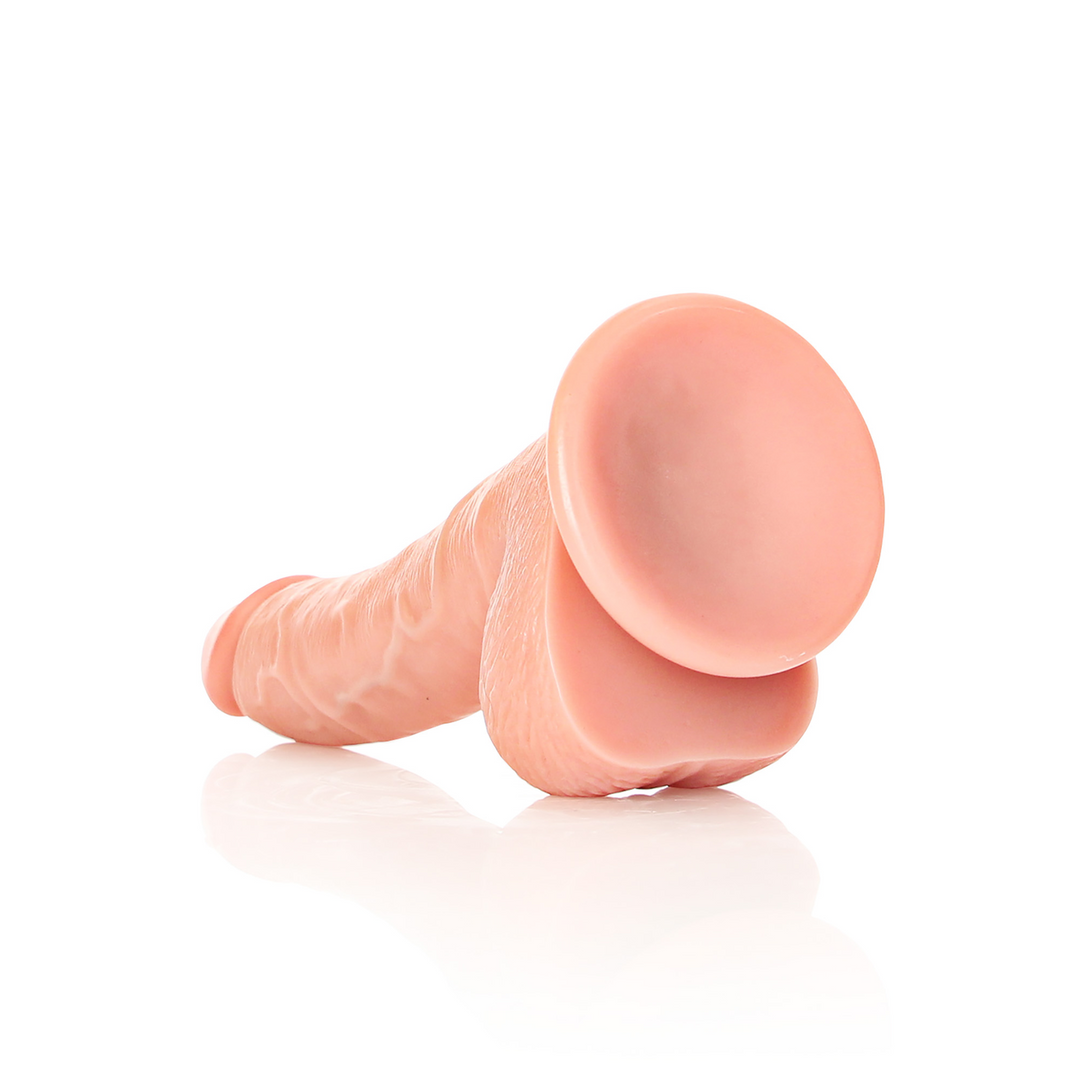Realrock by shots Gebogen Realistische Dildo met Ballen en Zuignap - 7 / 18 cm (7423522627686)