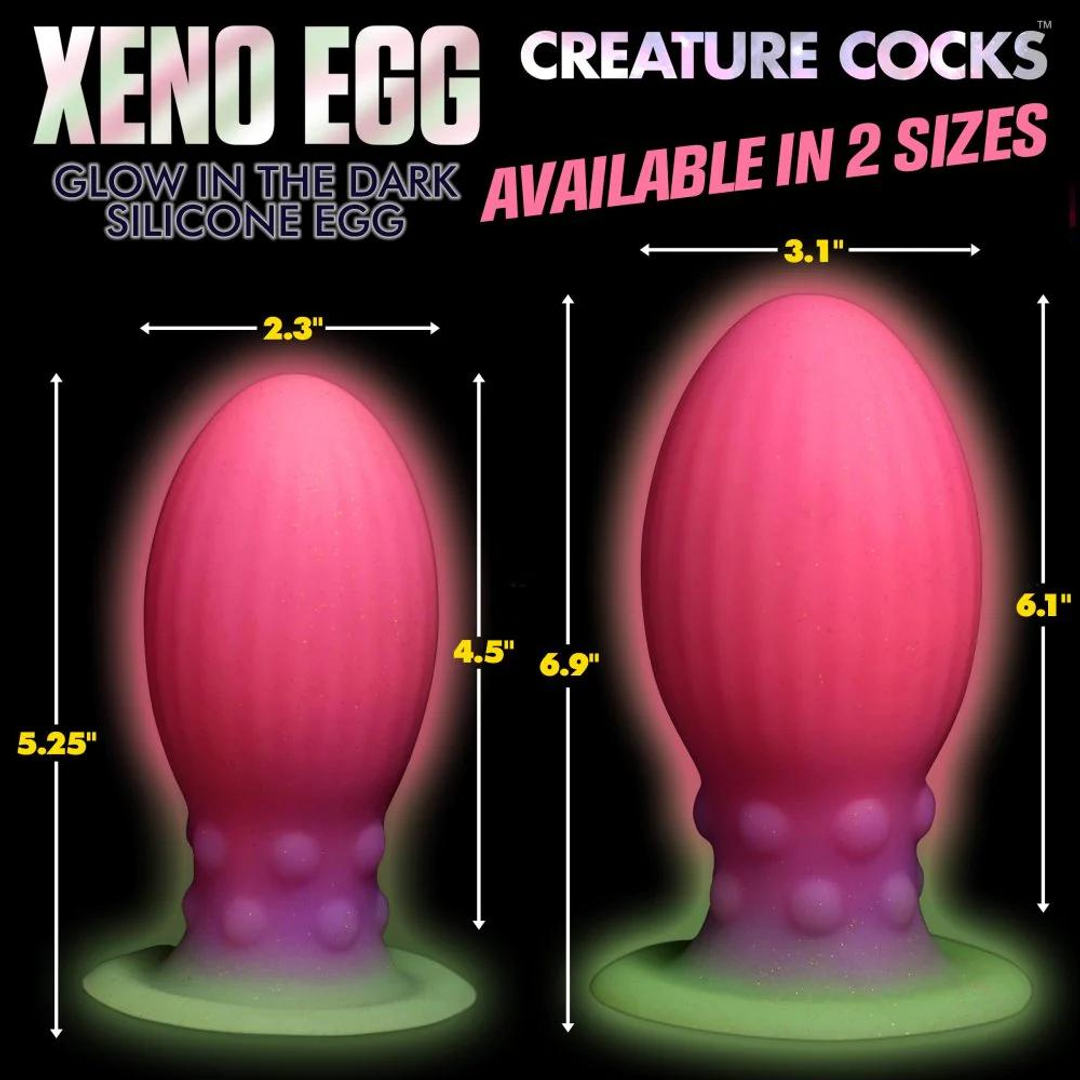 Xr brands Xeno Egg - Glow in the Dark - Siliconen Ei - XL - Roze (848518049070)